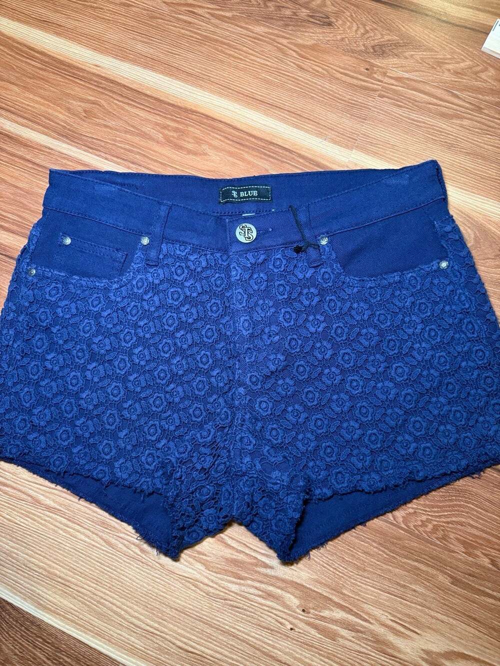 STS Blue navy denim shorts with floral detail